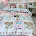 Side angle of the bed highlighting the pastel colors and puppy motifs.