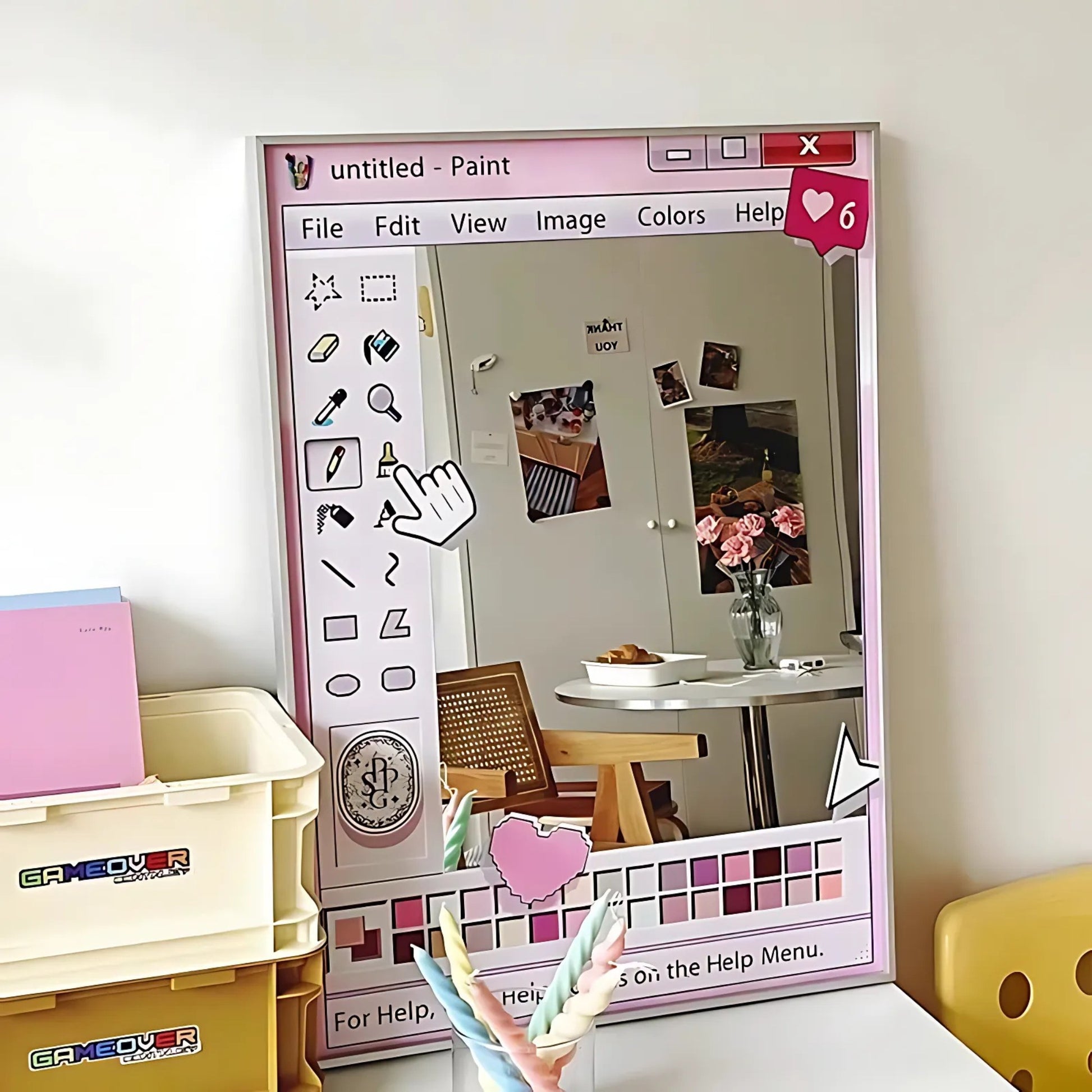 Wall mirror printed with an early computer interface and a row of color swatches