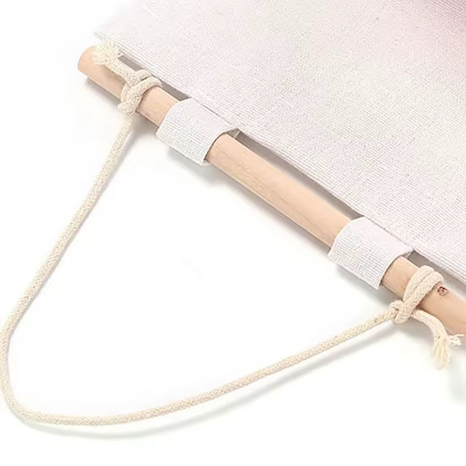 Wooden stick with white rope tied to it on a white background