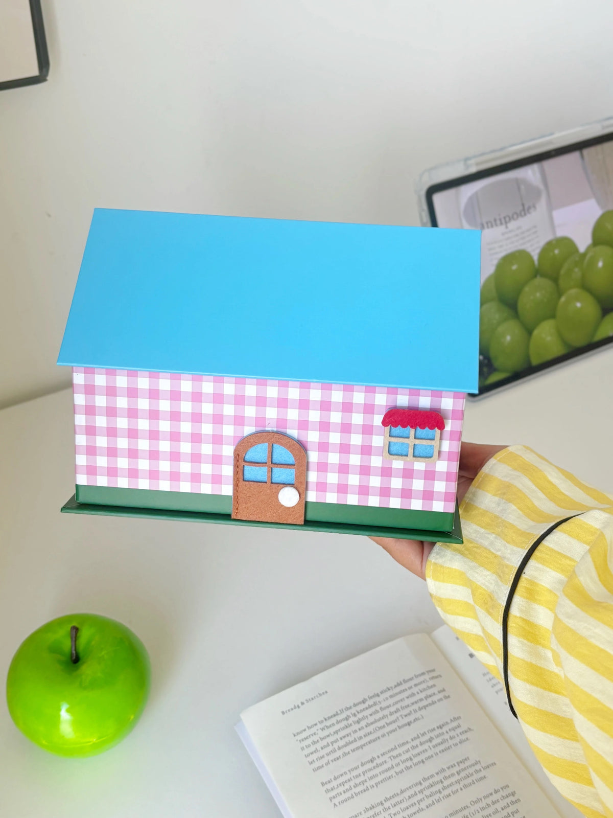 Front view of pink gingham house tissue box cover with blue roof
