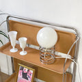 The lamp turned on, casting a warm ambient glow in a cozy room