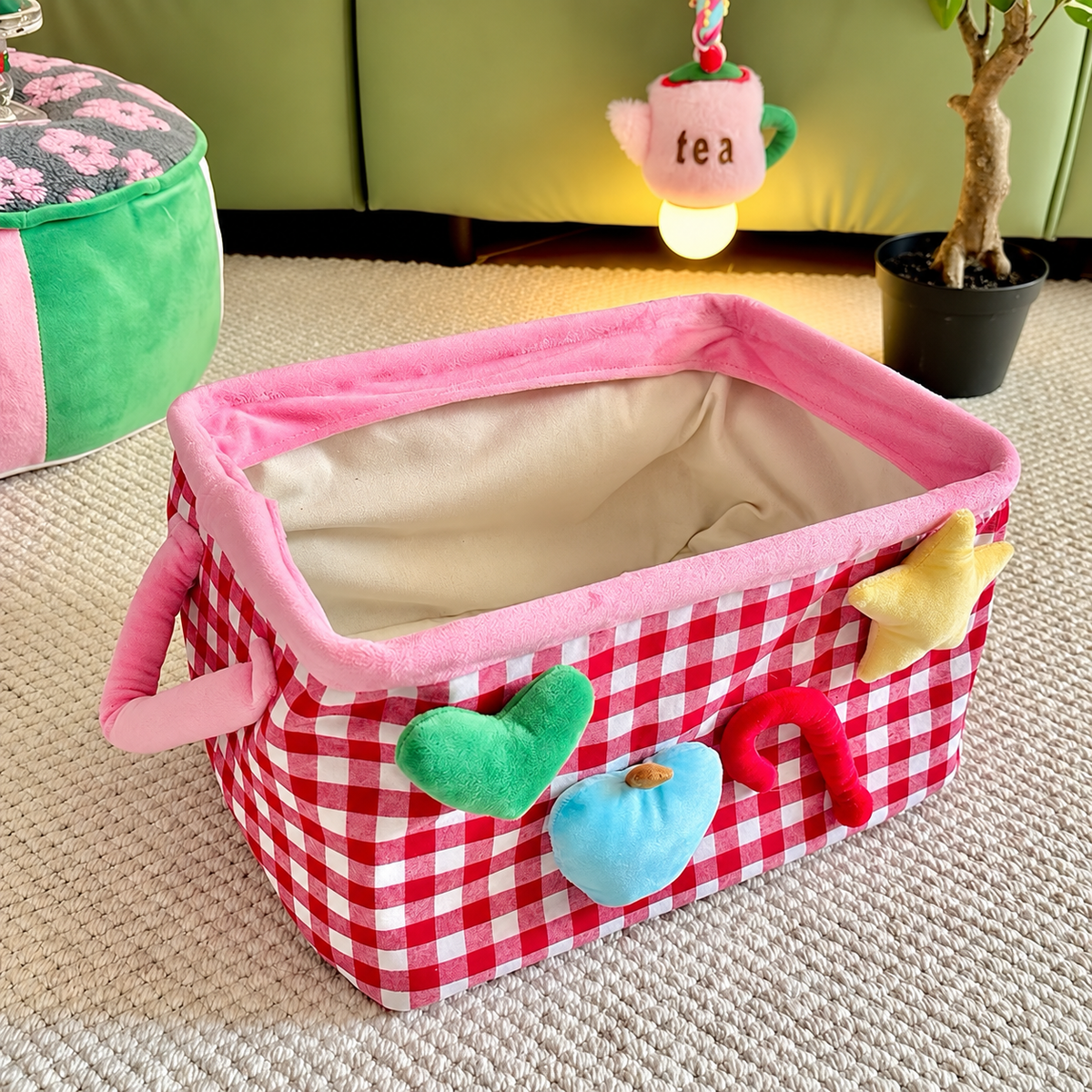 Red checkered storage basket with handles and colorful front details