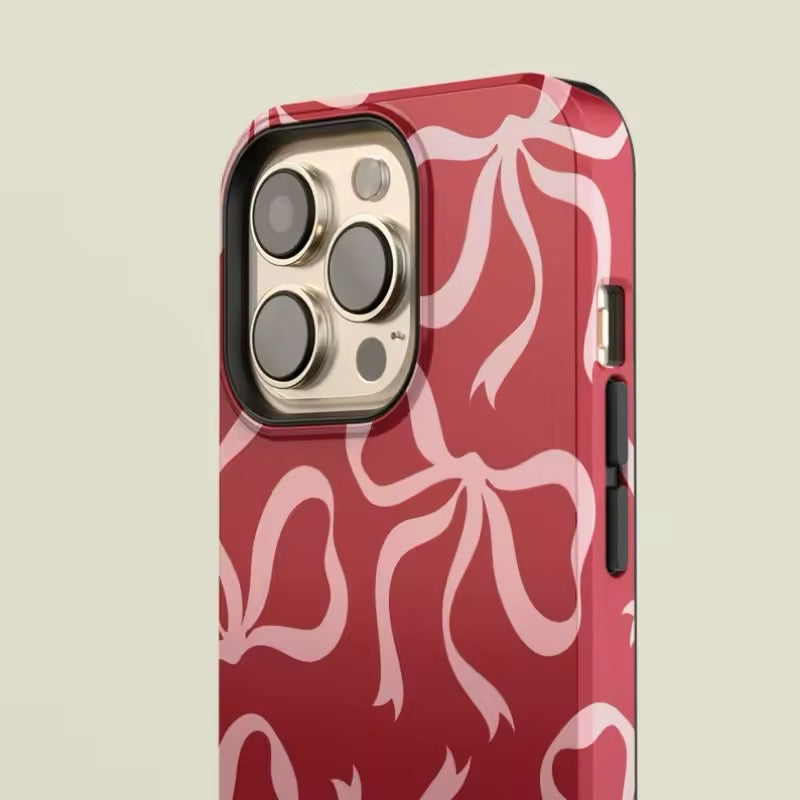 Red phone case with pink bows for iPhone 16, 15, 14