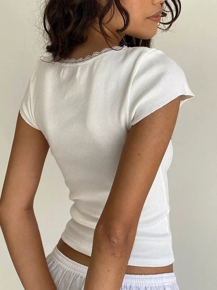 Elegant white knitted crop top with lace trim. Cottagecore summer T-shirt with square neck and milkmaid style for women.