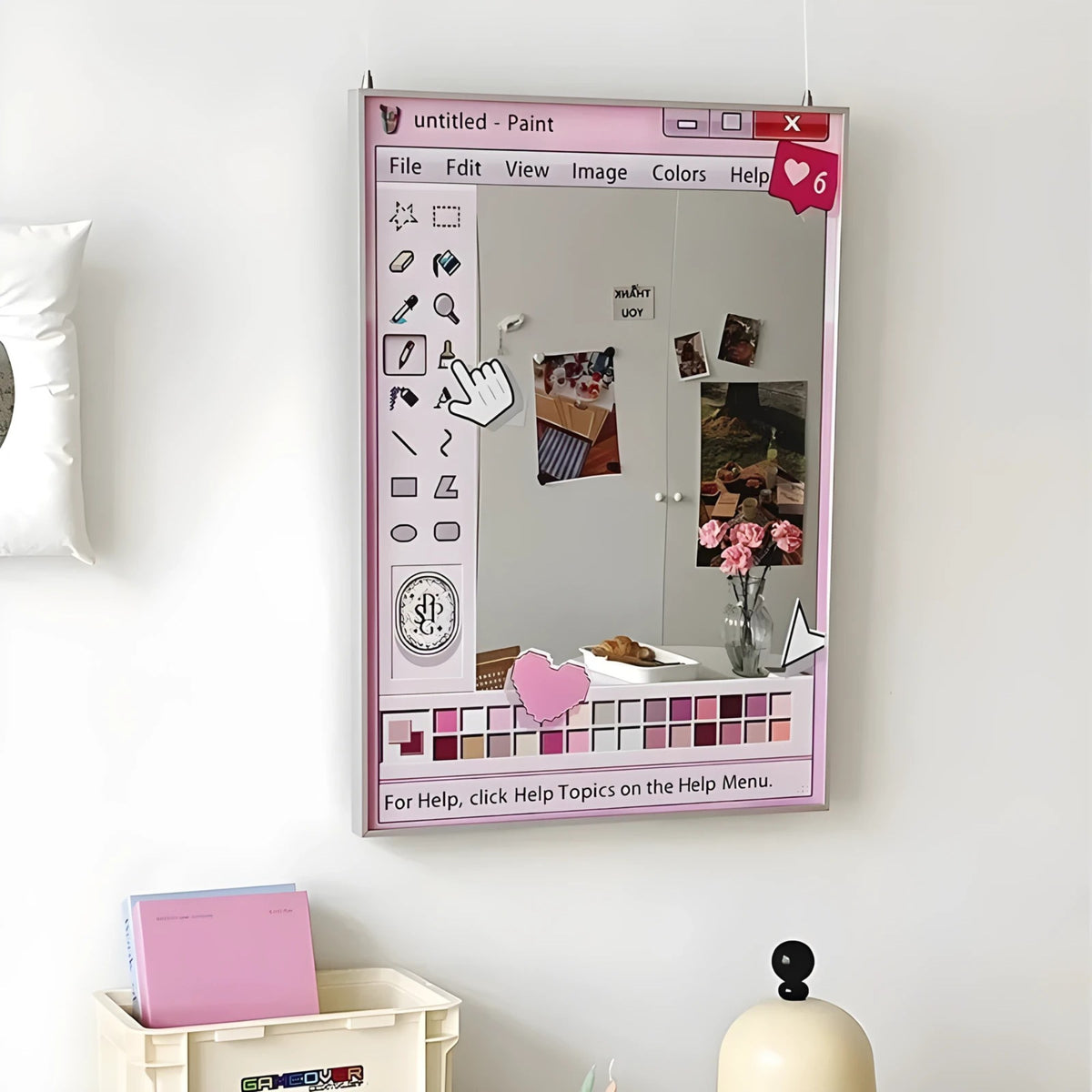 Retro computer window mirror with blocky toolbar icons around the reflective center
