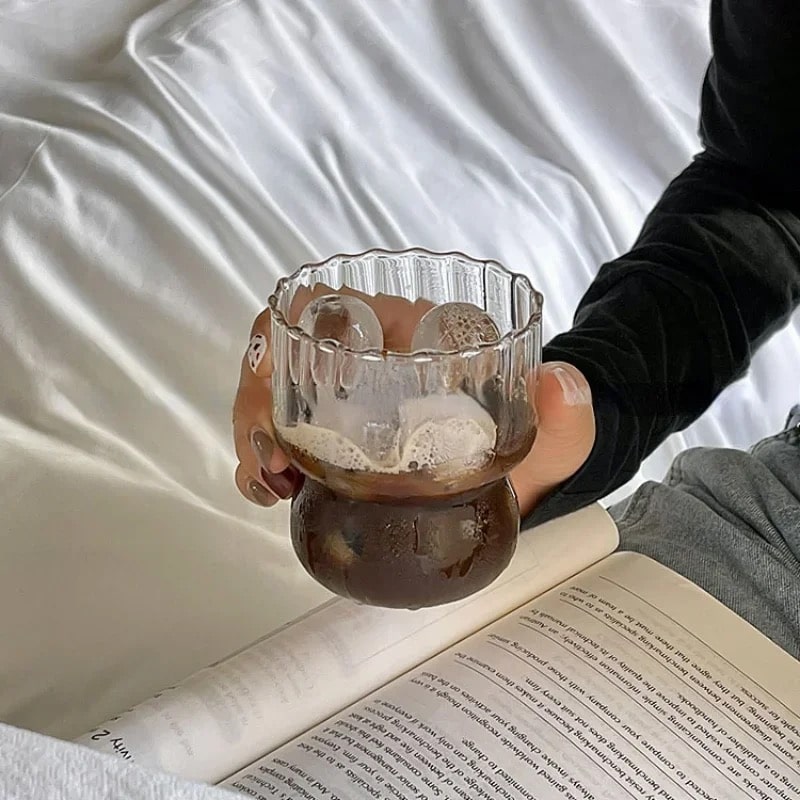 Retro highball wavy glass cup for iced coffee, milk, and cocktails. Stylish drinkware for modern kitchens and bar setups.
