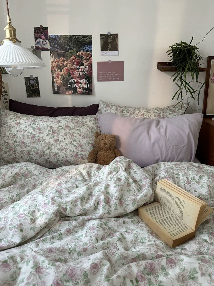 Elegant botanical bedding set featuring soft rose pattern designed for cozy cottage inspired home decorating every season.