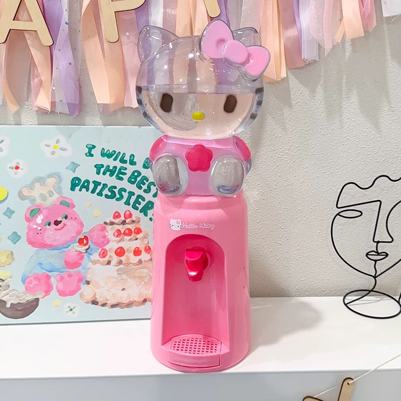 Adorable Hello Kitty water dispenser with pink cup, perfect for kawaii lovers