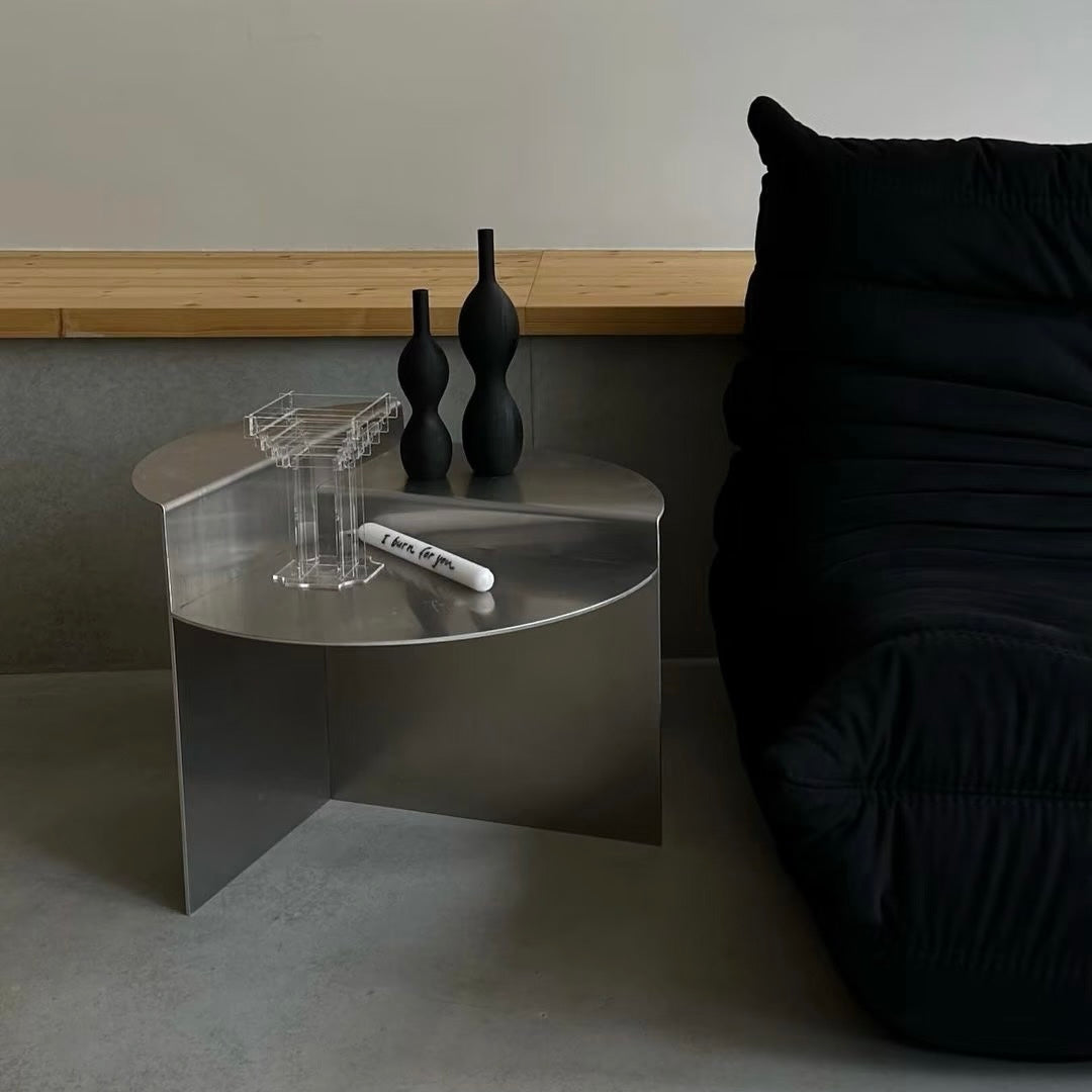 Contemporary stainless steel coffee table perfect beside sofa creating elegant centerpiece for modern everyday living spaces effortlessly.