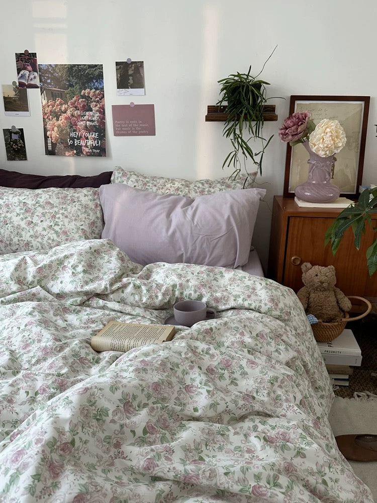 Floral cotton duvet cover adding gentle color breathable comfort and timeless vintage appeal to relaxing sleep environment.