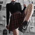 Black Y2K bodycon crop top with long sleeves and letter embroidery. Gothic style turtleneck perfect for e-girl casual wear.