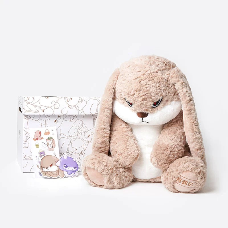 A child hugging the Angry Rabbit Plush, showing its huggable size.