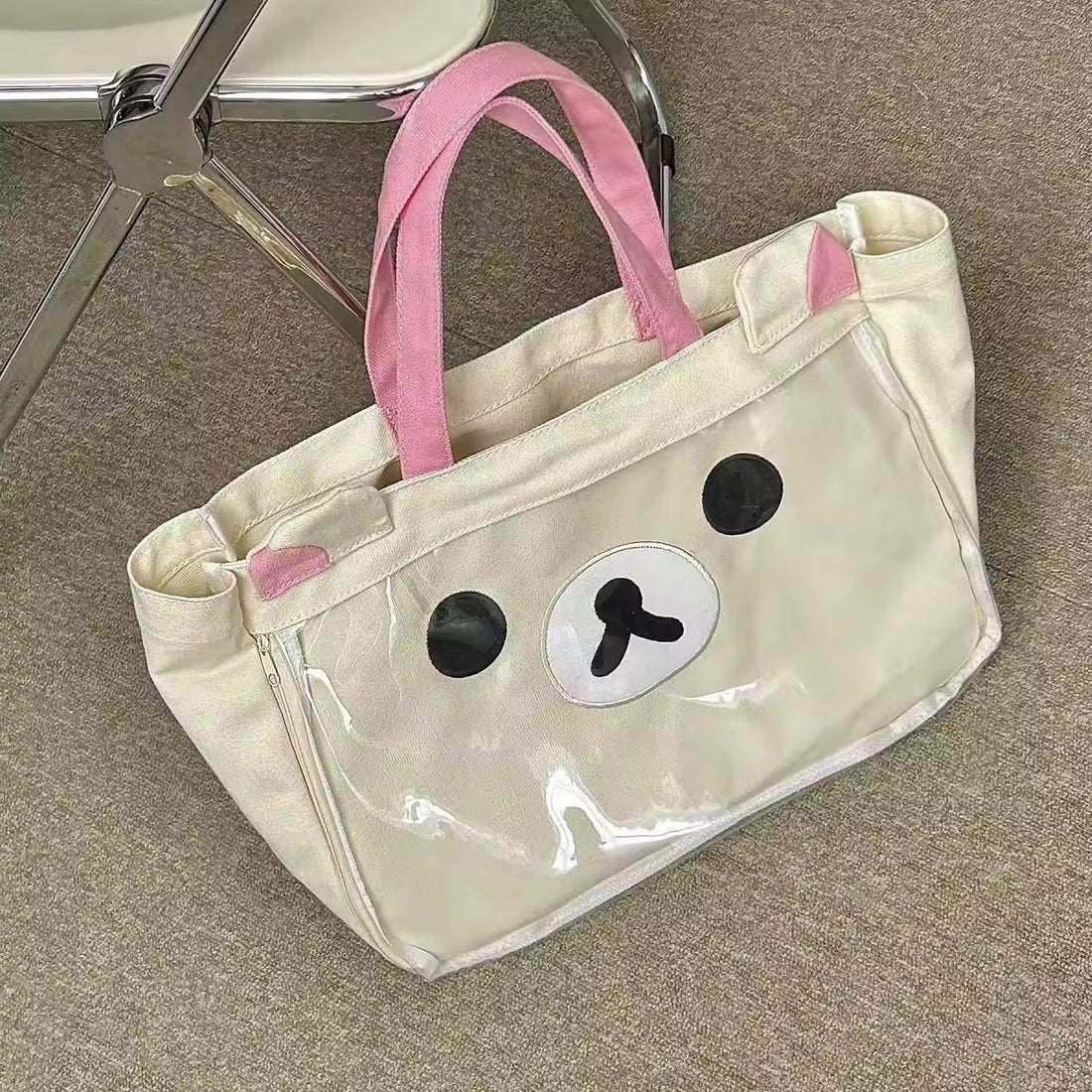 Kawaii rilakkumaed tote bag with pink handles on white background