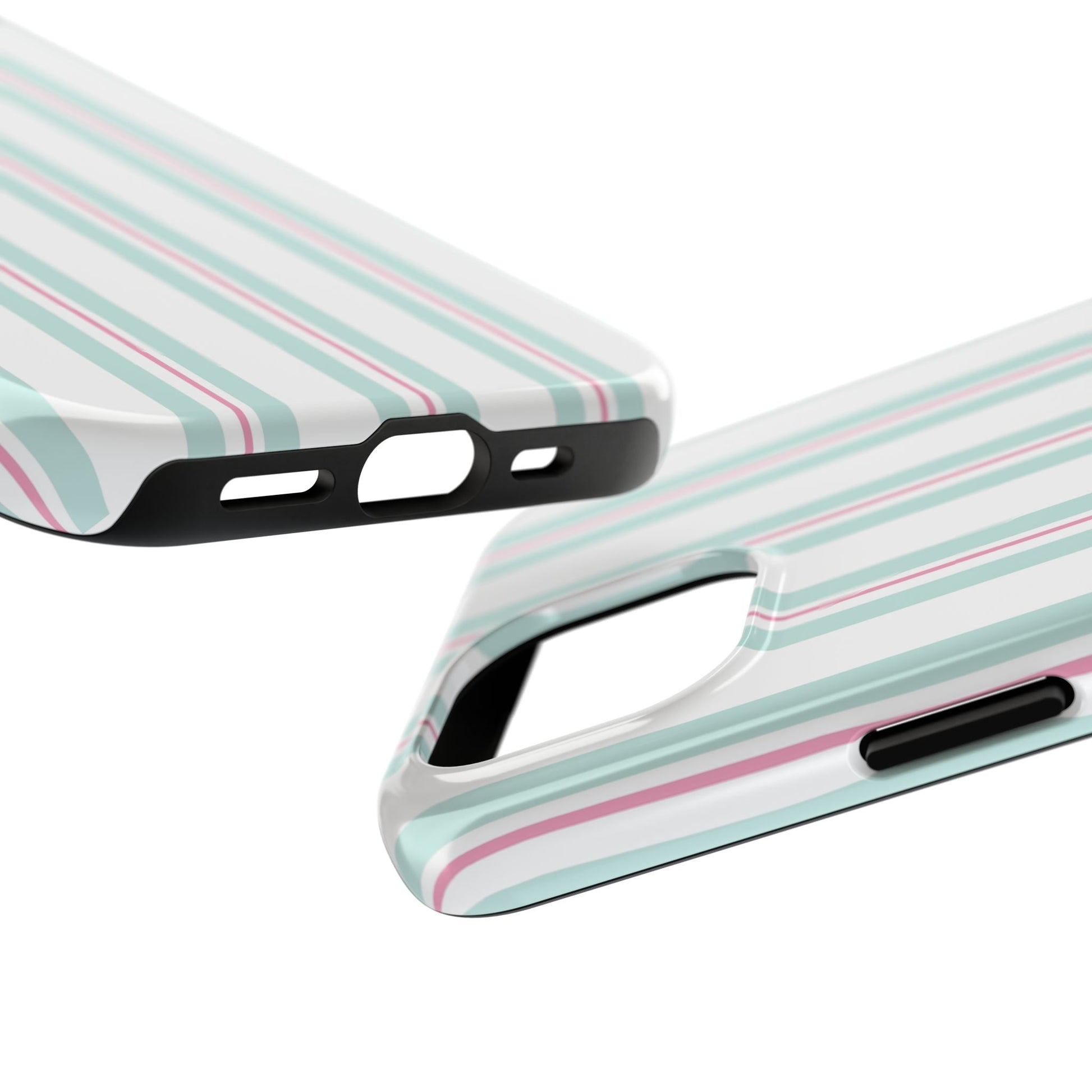Green and pink striped iPhone case on a study desk with pastel planners and dorm fairy lights for a Pinterest‑worthy scene.
