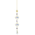 Golden hanging sun catcher reflecting light and colors