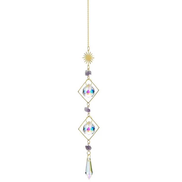 Golden hanging sun catcher reflecting light and colors