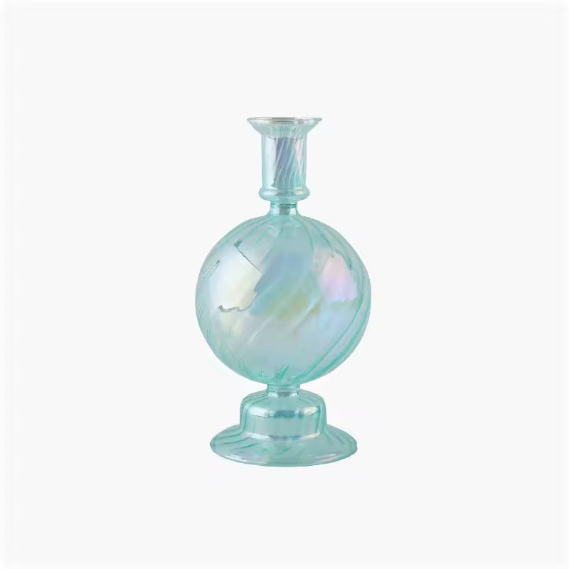 Iridescent glass bottle on a white background