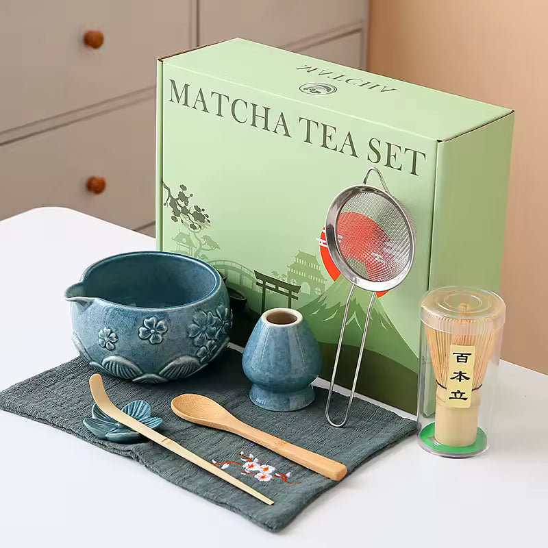Matcha tea set with green box labeled 'Matcha Tea Set' on a white surface.