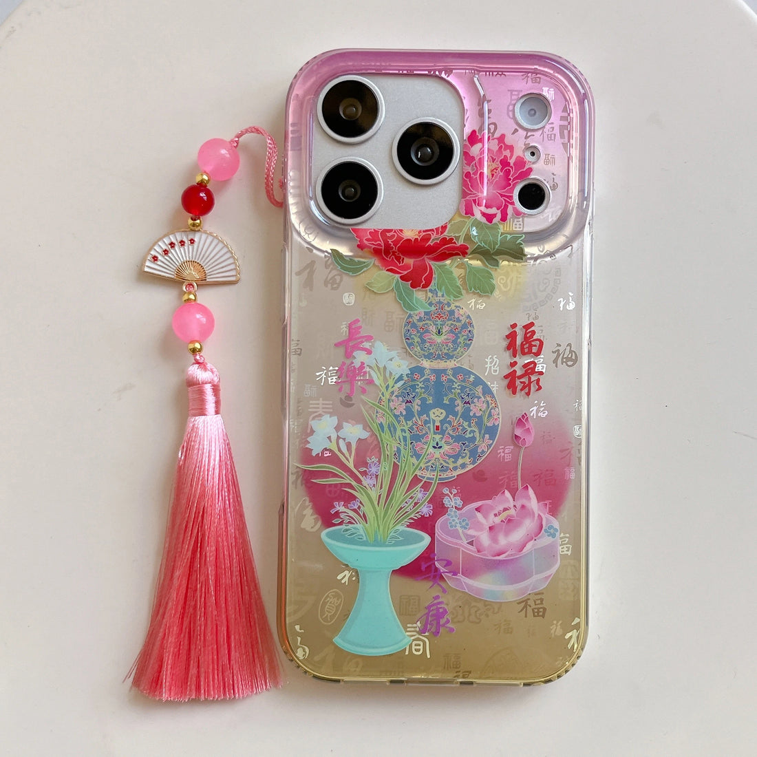 Coquette inspired floral silicone iPhone case with pink gradient peony artwork decorative Chinese calligraphy accents