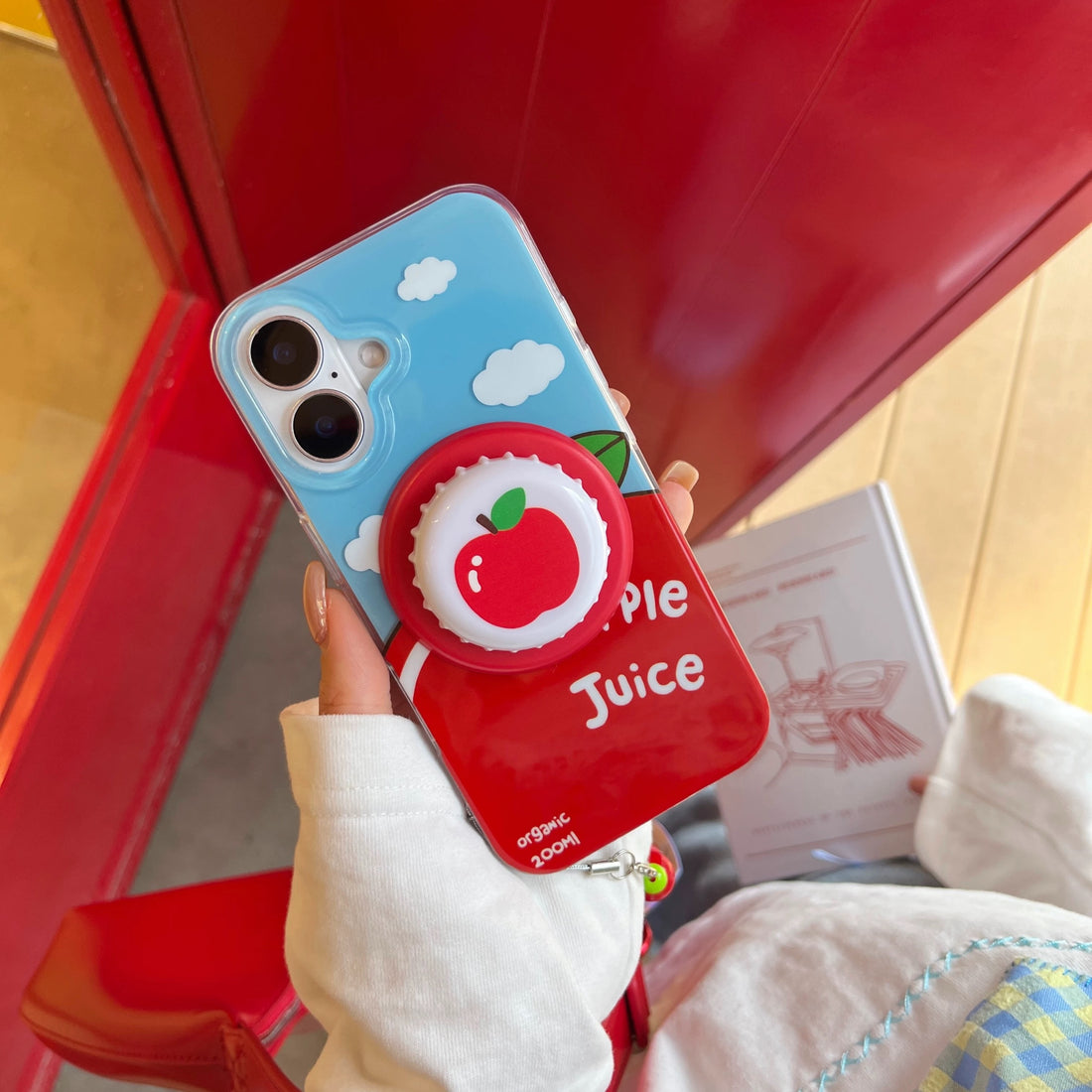 Kawaii Apple Juice MagSafe iPhone case with bottle cap grip. Cute fruitcore aesthetic Apple Juice phone case for iPhone 15 Pro Max.