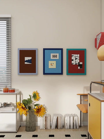 Three two-tone felt push pin boards styled as dopamine wall decor in a colorful living room.