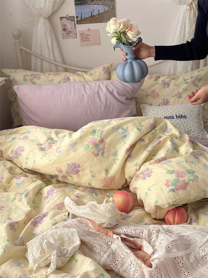 Romantic floral cotton duvet cover paired with matching pillowcases for charming feminine bedroom decorating ideas today