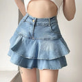 Stylish blue denim A-line skirt with high waist and ruffles. Perfect for summer streetwear and Y2K-inspired outfits.