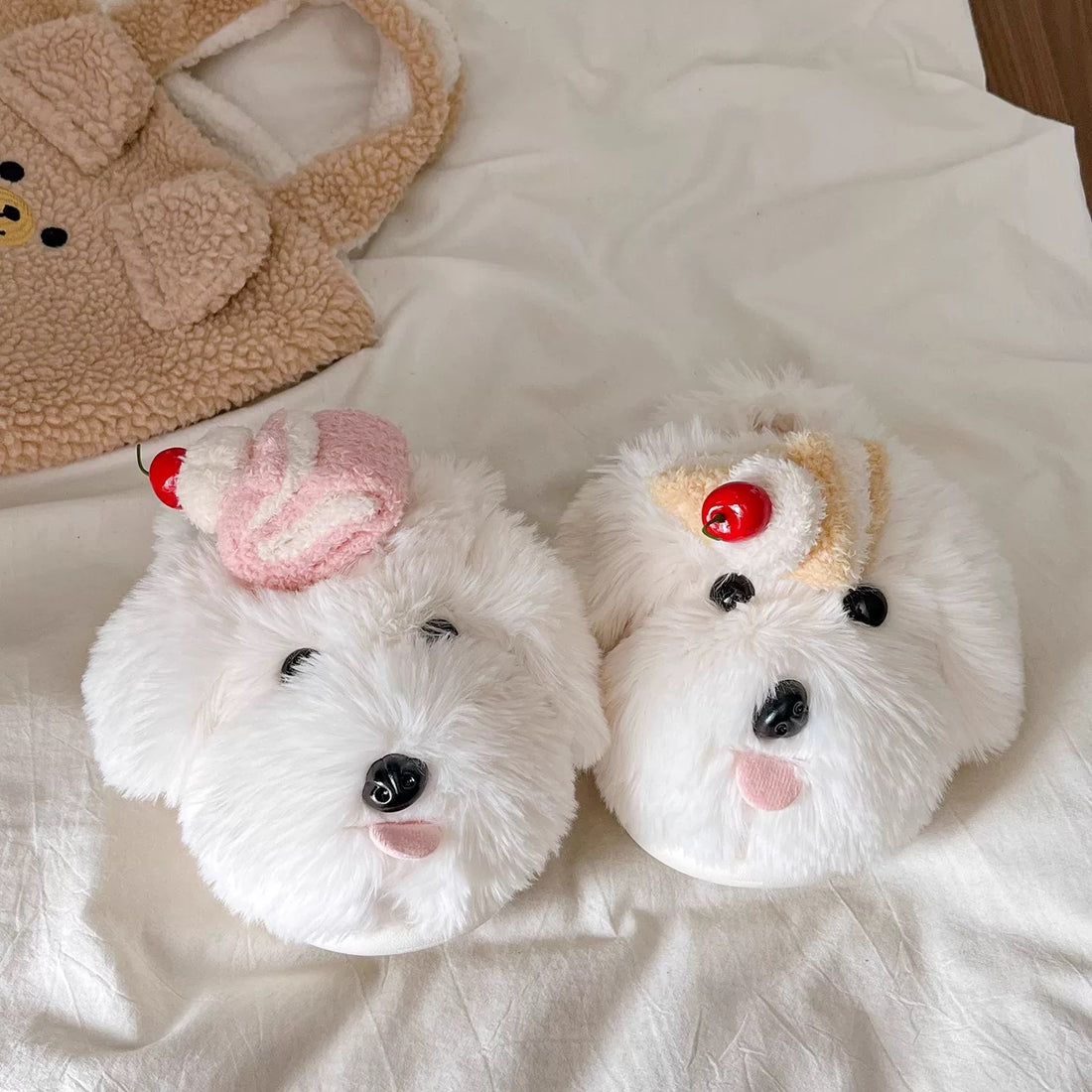 White cherry dog slippers with plush puppy faces and cake details