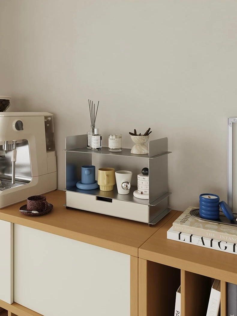White desk shelf with a drawer on a wood sideboard with a coffee machine and books