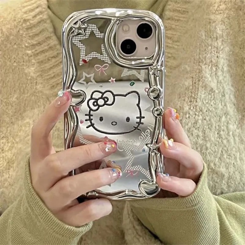 Y2K Hello Kitty iPhone case with silver mirror and rhinestones. Cute Sanrio design with anti-drop protection for iPhone 14, 13, 12, Pro Max.