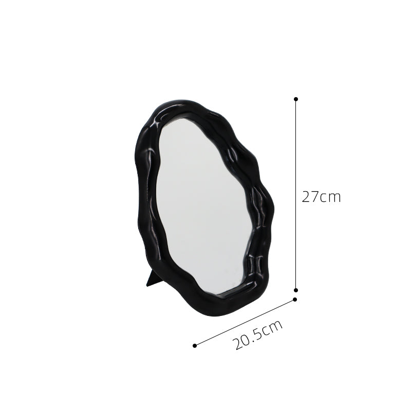 Black round mirror with measurements on a white background