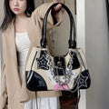 White Y2K Gothic tote bag with canvas and patent leather splicing. Stylish crossbody or underarm bag for daily or casual use.